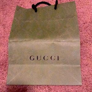 Gucci shopping bag in the color green.